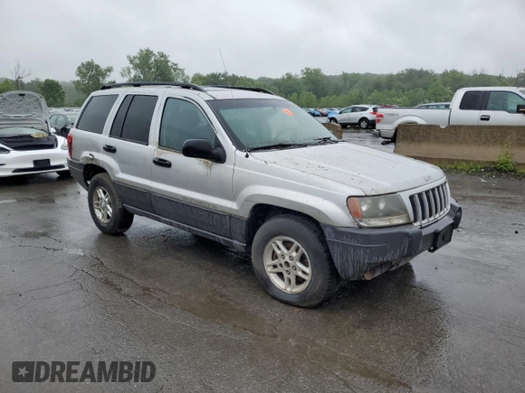 2004 Jeep Grand Cherokee Laredo z VIN 1J4GW48S74C288625, wystawiony jako Copart lot #61290805 z przebiegiem 194 615 mil mil oraz Czysty tytuł • Clean title. Historia ofert i sprzedaży dostępna na DreamBid. Obrazek 4.