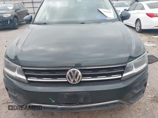 2019 Volkswagen Tiguan S with VIN 3VV1B7AXXKM002312, listed as a IAAI auction lot 42282809 with 80,781 mi miles and . Bid and sale history available at DreamBid. Image 12.