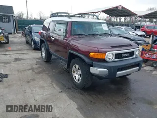2007 Toyota FJ Cruiser with VIN JTEBU11F970023210, listed as a IAAI auction lot 41897851 with 128,520 mi miles. Bid and sale history available at carsss.com. Image 1.
