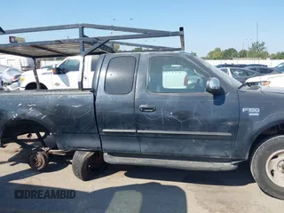 1999 Ford F-150 с VIN 1FTRX17W5XNA42082, выставлен на аукционе IAAI как лот 40599993 с пробегом Не указан миль и . История ставок и продаж доступна на DreamBid. Изображение 13.