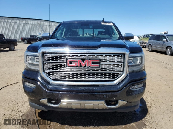 2017 GMC Sierra 1500 Denali z VIN 3GTU2PEJ7HG133884, wystawiony jako Copart lot #58940485 z przebiegiem 241 697 mil mil oraz Czysty tytuł • Clean title. Historia ofert i sprzedaży dostępna na DreamBid. Obrazek 5.