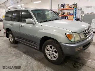 2004 Lexus LX 470 with VIN JTJHT00W843548361, listed as a Copart auction lot 76465204 with 257,543 mi miles and Salvage Title. Bid and sale history available at carsss.com. Image 4.