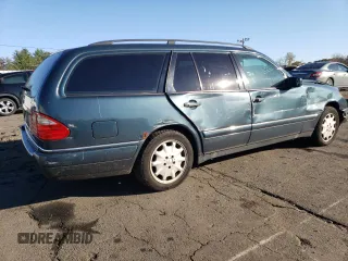 1999 Mercedes-Benz E-Class with VIN WDBJH82F4XX026758, listed as a Copart auction lot 76740804 with 136,782 mi miles and Salvage Title. Bid and sale history available at carsss.com. Image 3.