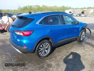 2020 Ford Escape Titanium Hybrid with VIN 1FMCU9DZ1LUB59214, listed as a IAAI auction lot 42050336 with 59,547 mi miles and . Bid and sale history available at DreamBid. Image 4.