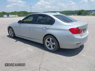 2013 BMW 3 Series 328i with VIN WBA3C1G5XDNR45054, listed as a IAAI auction lot 42504007 with 152,705 mi miles and . Bid and sale history available at DreamBid. Image 3.