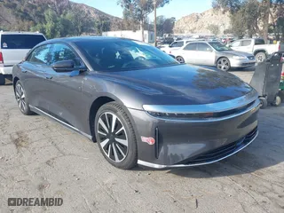2024 Lucid Air Pure with VIN 50EA1PGA4RA004886, listed as a IAAI auction lot 41349451 with 4,165 mi miles. Bid and sale history available at carsss.com. Image 1.