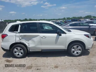 2018 Subaru Forester z VIN JF2SJAAC0JG456885, wystawiony jako IAAI lot #42447740 z przebiegiem 73 768 mil mil oraz . Historia ofert i sprzedaży dostępna na DreamBid. Obrazek 13.