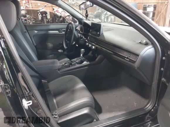2023 Honda Civic Sport with VIN 2HGFE2F52PH505538, listed as a IAAI auction lot 42447559 with 36,621 mi miles and . Bid and sale history available at DreamBid. Image 5.