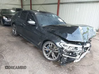2018 BMW 5 Series M550i xDrive with VIN WBAJB9C51JB035949, listed as a IAAI auction lot 42085727 with Not provided miles and . Bid and sale history available at DreamBid. Image 1.
