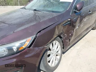2014 Kia Optima EX z VIN 5XXGN4A77EG338455, wystawiony jako IAAI lot #42071765 z przebiegiem 136 331 mil mil oraz . Historia ofert i sprzedaży dostępna na DreamBid. Obrazek 6.