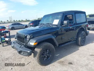 2021 Jeep Wrangler Sport z VIN 1C4GJXAN7MW796019, wystawiony jako IAAI lot #42172407 z przebiegiem 34 128 mil mil oraz . Historia ofert i sprzedaży dostępna na DreamBid. Obrazek 2.