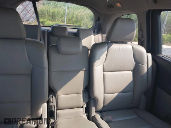 2012 Honda Odyssey EX-L with VIN 5FNRL5H65CB039015, listed as a IAAI auction lot 42612886 with 216,955 mi miles and . Bid and sale history available at DreamBid. Image 8.