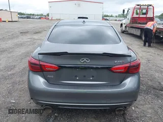 2021 Infiniti Q50 Red Sport 400 with VIN JN1FV7DR2MM880505, listed as a IAAI auction lot 42377058 with 59,618 mi miles and . Bid and sale history available at DreamBid. Image 16.