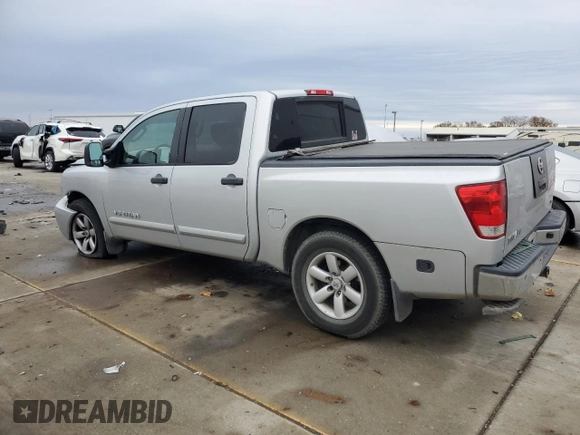 2011 Nissan Titan SL with VIN 1N6AA0ED2BN305628, listed as a Copart auction lot 85012324 with 188,329 mi miles and Salvage Title. Bid and sale history available at carsss.com. Image 2.