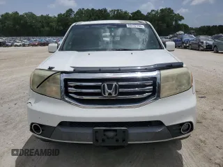 2015 Honda Pilot EX-L z VIN 5FNYF3H77FB007042, wystawiony jako Copart lot #60122705 z przebiegiem 183 727 mil mil oraz Szkoda całkowita • Salvage title. Historia ofert i sprzedaży dostępna na DreamBid. Obrazek 5.