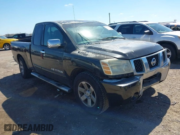 2005 Nissan Titan XE with VIN 1N6BA06A15N560400, listed as a IAAI auction lot 41656560 with 212,568 mi miles. Bid and sale history available at carsss.com. Image 1.