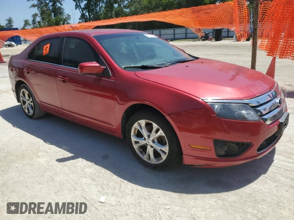 2012 Ford Fusion SE z VIN 3FAHP0HG0CR421694, wystawiony jako Copart lot #57179145 z przebiegiem 208 731 mil mil oraz Czysty tytuł • Clean title. Historia ofert i sprzedaży dostępna na DreamBid. Obrazek 4.
