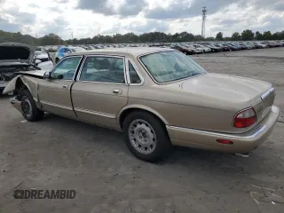 1999 Jaguar XJ z VIN SAJKX6048XC849376, wystawiony jako Copart lot #70538064 z przebiegiem 122 891 mil mil oraz Szkoda całkowita • Salvage title. Historia ofert i sprzedaży dostępna na DreamBid. Obrazek 2.
