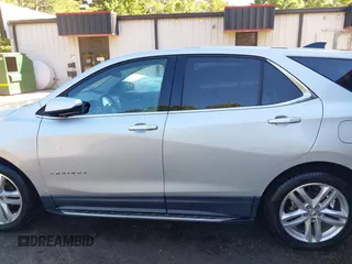 2019 Chevrolet Equinox LT z VIN 2GNAXKEV1K6189548, wystawiony jako IAAI lot #42315123 z przebiegiem 51 799 mil mil oraz . Historia ofert i sprzedaży dostępna na DreamBid. Obrazek 14.