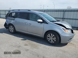 2016 Honda Odyssey SE with VIN 5FNRL5H36GB144433, listed as a Copart auction lot 48898755 with 192,442 mi miles and Salvage Title. Bid and sale history available at DreamBid. Image 4.