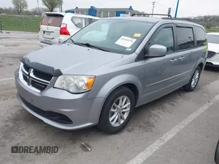 2014 Dodge Grand Caravan SXT with VIN 2C4RDGCG0ER417662, listed as a IAAI auction lot 41933279 with 156,751 mi miles and . Bid and sale history available at DreamBid. Image 2.