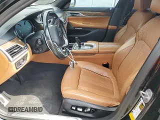 2016 BMW 7 Series 750i with VIN WBA7F0C53GGM20760, listed as a Copart auction lot 57230334 with 77,588 mi miles and Salvage Title. Bid and sale history available at carsss.com. Image 7.