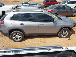 2019 Jeep Cherokee Latitude with VIN 1C4PJLCX7KD220799, listed as a IAAI auction lot 41970875 with 104,394 mi miles and . Bid and sale history available at DreamBid. Image 13.