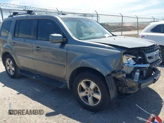 2009 Honda Pilot EX-L with VIN 5FNYF38559B023873, listed as a IAAI auction lot 42304913 with 140,300 mi miles and . Bid and sale history available at DreamBid. Image 1.