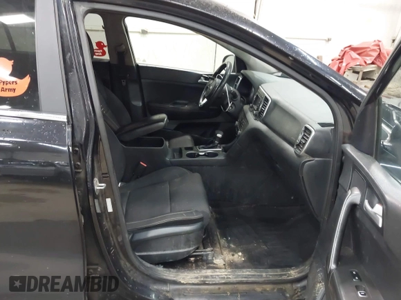 2018 Kia Sportage LX z VIN KNDPMCAC9J7351060, wystawiony jako IAAI lot #42011814 z przebiegiem 174 504 mil mil oraz . Historia ofert i sprzedaży dostępna na DreamBid. Obrazek 5.