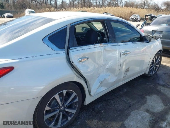 2016 Nissan Altima 2.5 SR with VIN 1N4AL3AP0GN374846, listed as a IAAI auction lot 41659546 with 126,496 mi miles. Bid and sale history available at carsss.com. Image 20.