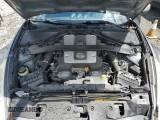 2009 Nissan 370Z z VIN JN1AZ44E69M409779, wystawiony jako Copart lot #55615955 z przebiegiem 132 674 mil mil oraz Szkoda całkowita • Salvage title. Historia ofert i sprzedaży dostępna na DreamBid. Obrazek 11.