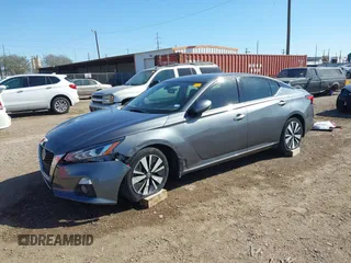 2019 Nissan Altima SV with VIN 1N4BL4DVXKN305921, listed as a IAAI auction lot 41822527 with 137,205 mi miles and . Bid and sale history available at DreamBid. Image 2.