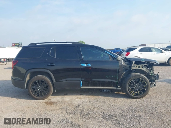 2023 GMC Acadia SLT with VIN 1GKKNMLS8PZ253608, listed as a IAAI auction lot 42264701 with 25,469 mi miles and . Bid and sale history available at DreamBid. Image 14.