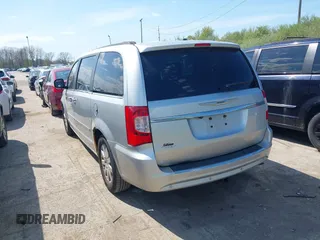2011 Chrysler Town & Country Touring L with VIN 2A4RR8DG8BR797653, listed as a IAAI auction lot 42115304 with 185,613 mi miles and . Bid and sale history available at DreamBid. Image 3.