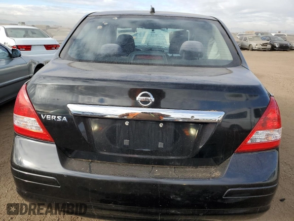 2009 Nissan Versa 1.8 S with VIN 3N1BC11E19L382395, listed as a Copart auction lot 41666375 with 153,899 mi miles and Salvage Title. Bid and sale history available at carsss.com. Image 6.