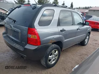2008 Kia Sportage LX with VIN KNDJE723287540085, listed as a IAAI auction lot 41833371 with 189,372 mi miles and . Bid and sale history available at DreamBid. Image 4.