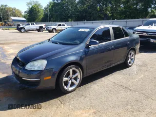 2009 Volkswagen Jetta S with VIN 3VWJM71K69M014980, listed as a Copart auction lot 55741275 with 122,677 mi miles and Salvage title. Bid and sale history available at DreamBid. Image 1.