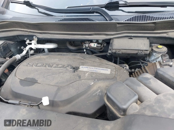 2016 Honda Pilot EX-L with VIN 5FNYF6H53GB070382, listed as a IAAI auction lot 39476567 with 83,741 mi miles and . Bid and sale history available at DreamBid. Image 10.
