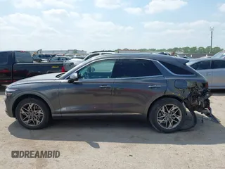 2023 Genesis GV70 2.5T with VIN KMUMADTB9PU084936, listed as a IAAI auction lot 42040232 with 28,201 mi miles and . Bid and sale history available at DreamBid. Image 14.