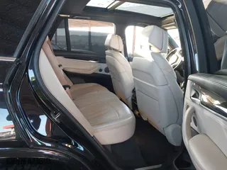 2017 BMW X5 xDrive40e iPerformance with VIN 5UXKT0C35H0V97078, listed as a IAAI auction lot 41601844 with 85,597 mi miles. Bid and sale history available at carsss.com. Image 8.
