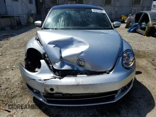 2016 Volkswagen Beetle with VIN 3VWF07AT9GM619860, listed as a Copart auction lot 56357605 with 67,212 mi miles and Salvage Title. Bid and sale history available at DreamBid. Image 5.