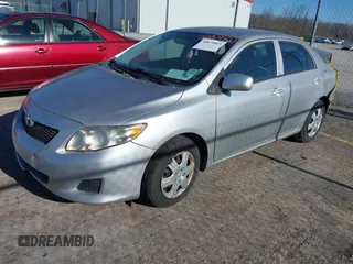 2010 Toyota Corolla with VIN 2T1BU4EE9AC322961, listed as a IAAI auction lot 40879803 with 146,996 mi miles and . Bid and sale history available at DreamBid. Image 2.