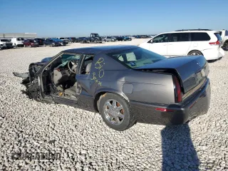 1999 Cadillac Eldorado Touring z VIN 1G6ET1299XU612153, wystawiony jako Copart lot #86257044 z przebiegiem Nie podano mil oraz Nie do naprawy. Historia ofert i sprzedaży dostępna na DreamBid. Obrazek 2.