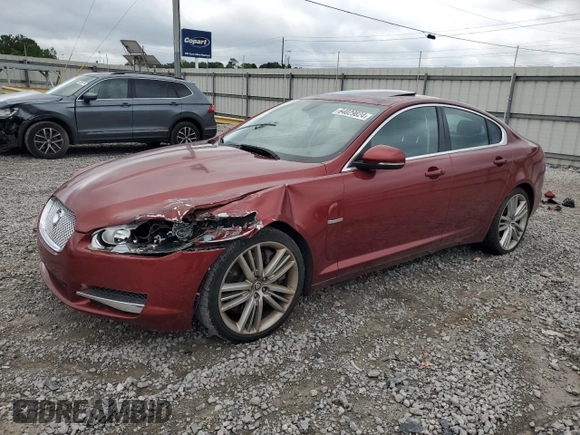 2010 Jaguar XF Supercharged with VIN SAJWA0HE1AMR74203, listed as a Copart auction lot 64029824 with 128,676 mi miles and Salvage Title. Bid and sale history available at carsss.com. Image 1.
