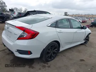 2019 Honda Civic Sport with VIN 19XFC2F82KE013269, listed as a IAAI auction lot 42118857 with 80,212 mi miles and . Bid and sale history available at DreamBid. Image 4.