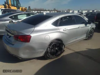 2014 Chevrolet Impala LTZ with VIN 2G1155S38E9217568, listed as a IAAI auction lot 41751805 with 95,147 mi miles. Bid and sale history available at carsss.com. Image 4.