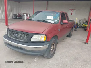 2003 Ford F-150 XL with VIN 1FTRX17L63NB64675, listed as a IAAI auction lot 42577516 with Not provided miles and . Bid and sale history available at DreamBid. Image 2.