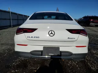 2021 Mercedes-Benz CLA with VIN W1K5J4HBXMN199220, listed as a Copart auction lot 86673214 with 29,801 mi miles and Salvage Title. Bid and sale history available at carsss.com. Image 6.