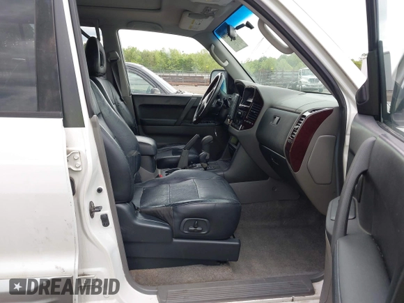 2002 Mitsubishi Montero Limited z VIN JA4MW51R02J071877, wystawiony jako IAAI lot #42214274 z przebiegiem 242 762 mil mil oraz . Historia ofert i sprzedaży dostępna na DreamBid. Obrazek 5.
