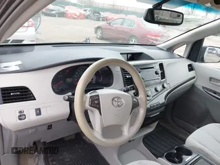 2012 Toyota Sienna LE with VIN 5TDJK3DCXCS047056, listed as a IAAI auction lot 41780756 with 179,624 mi miles. Bid and sale history available at carsss.com. Image 18.